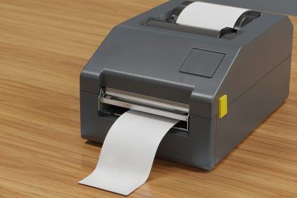 label-printer-wooden-surface label-printer-wooden-surface